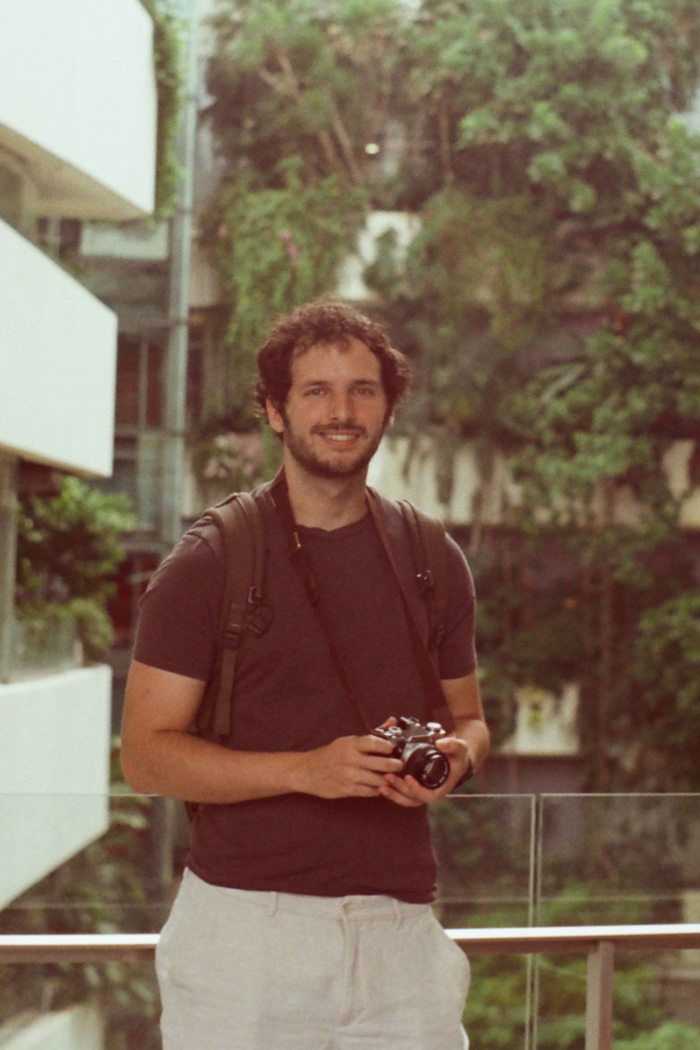 Pablo Ruiz Cuevas holding his Olympus OM-1